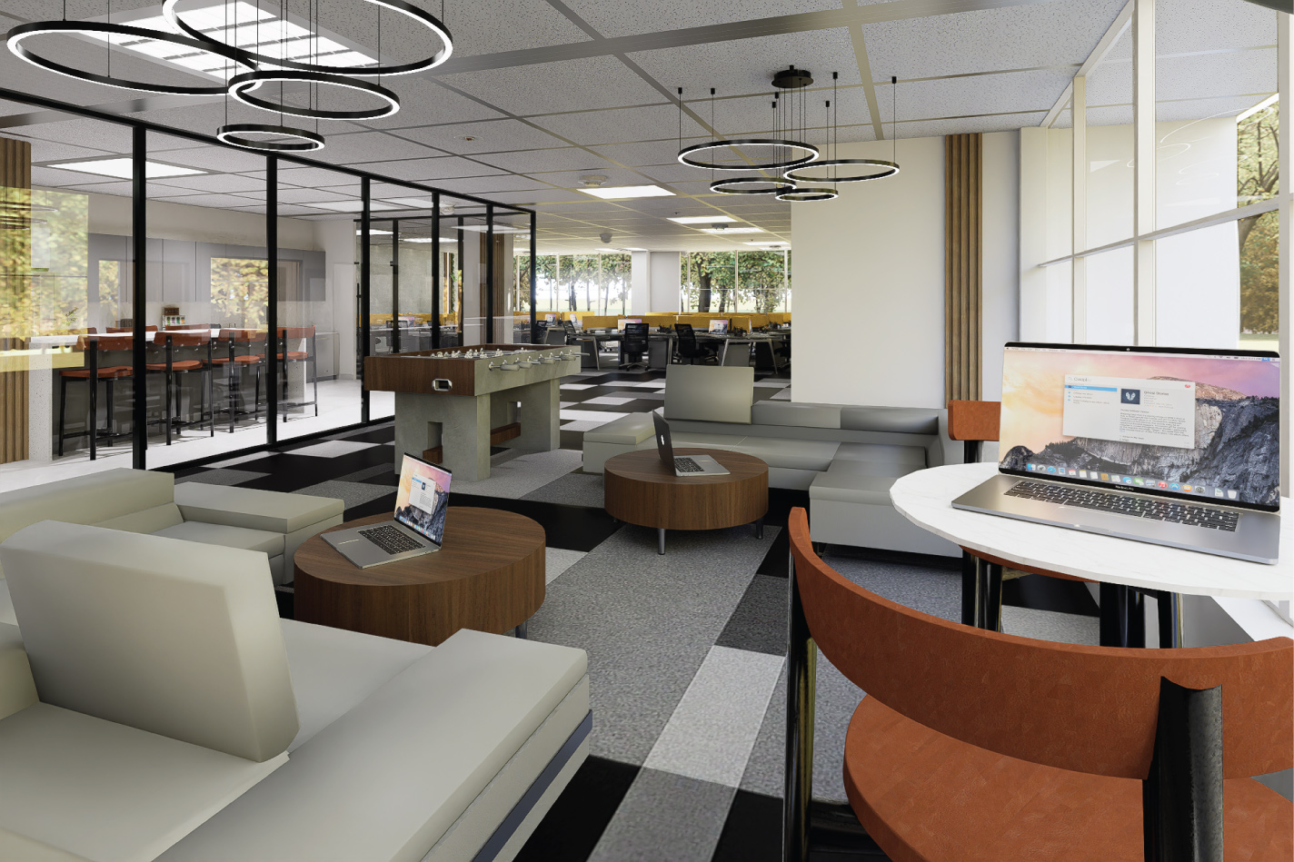 Contemporary corporate office interior design in Sarasota, Florida, featuring collaborative lounge areas, modern lighting, flexible workspaces, and functional commercial interiors.