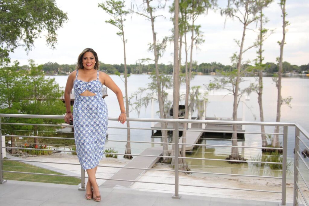 Lakefront terrace overlooking the private dock at Canvas Sur, a luxury residence in Windermere, Orange County, Florida.